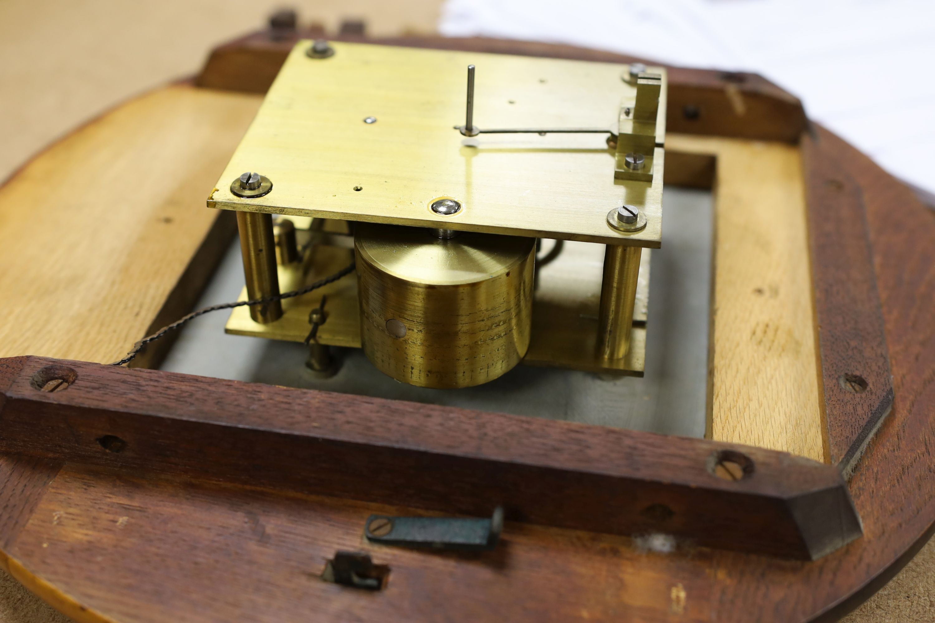 A Victorian oak-cased dial clock, signed JW Benson, London, 38 cms diameter.